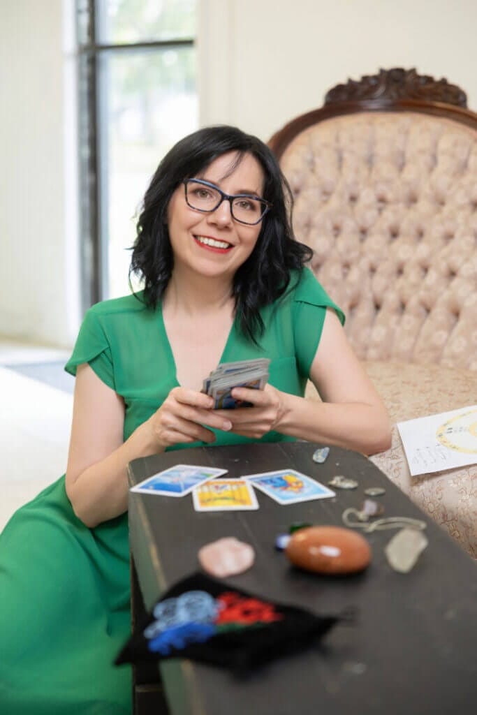 Tarot card reading with crystals and mystic items, exclusively at Embark on a captivating cosmic journey with Astrology Odyssey!